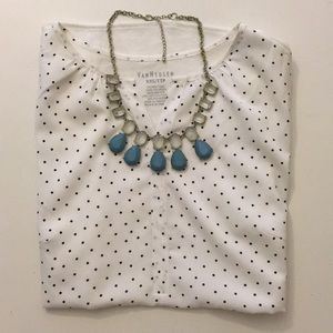 Sleeveless polka dot blouse